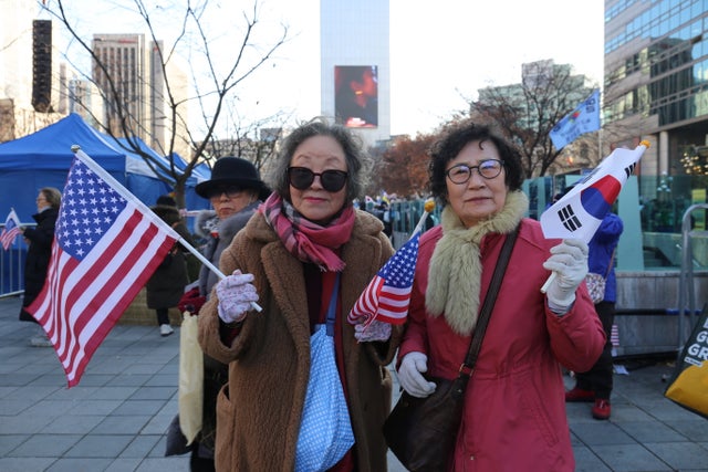 Park Chun-Suk och Lim Hae-Kyung vid ett möte för Sydkoreas president Yoon Suk-Yeol i Seoul.