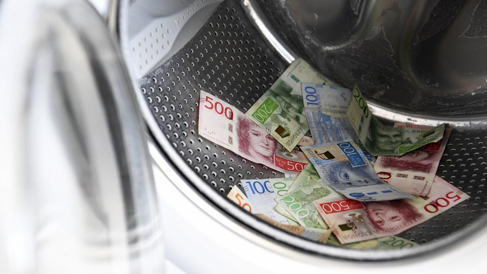 Metaforen "tvätta pengar" syftar på att pengar som kommer från brott ska verka som de kommer från laglig verksamhet. Foto: TT 