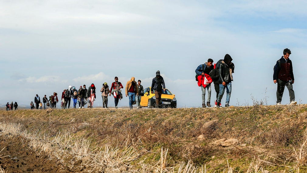 Migranter vid gränsen mellan Turkiet och Grekland.