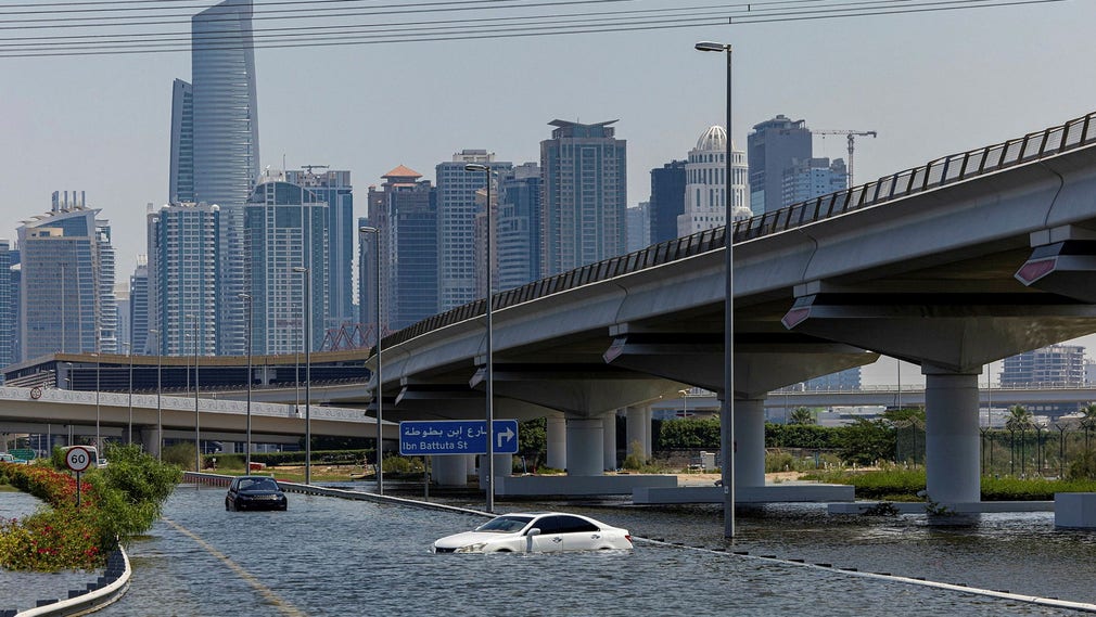 Abandoned car in water bodies in Dubai.