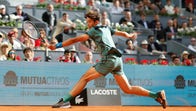16-åriga Darwin Blanch returnerar bollen från Rafael Nadal.