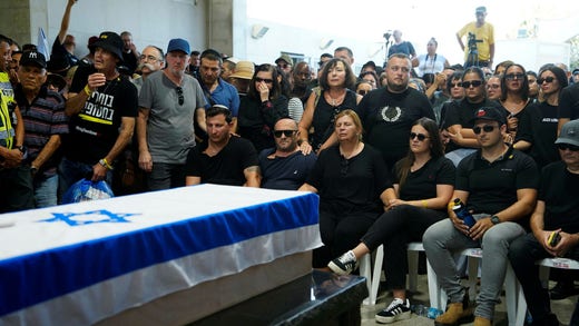 Mourners during the funeral of Alexander Lobanov in Ashkelon, southern Israel, on September 1.