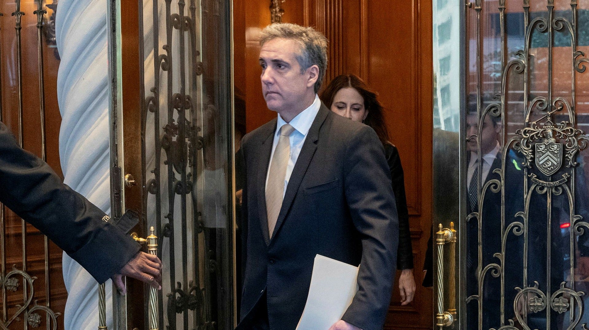 Michael Cohen, Trump's aide, continues to be questioned in a New York court.