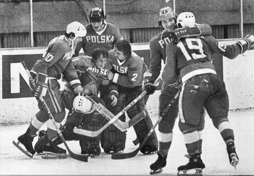 Polish goalkeeper Andzrej Tkacz was carried off the ice by his teammates after his heroics against the Soviet Union.  The night before the match, he was beaten by the Polish security service.