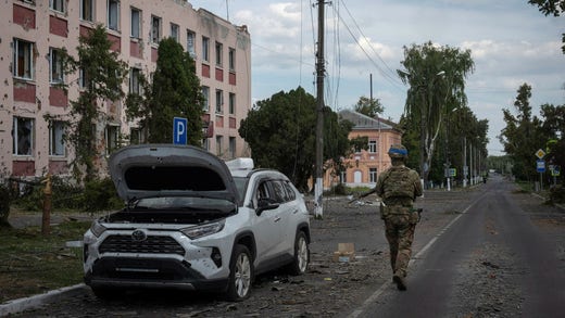 A Ukrainian soldier on a street in the Russian city of Sudza in mid-August.