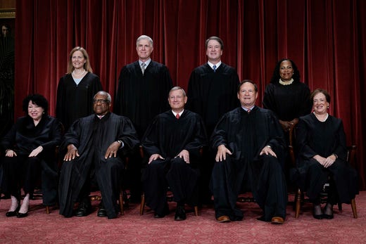 The nine justices who sit on the Supreme Court of the United States.