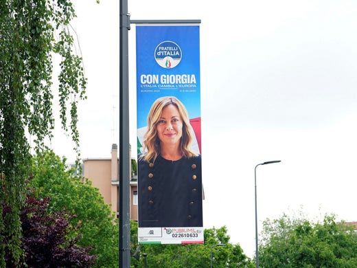 An election poster in Milan showing Prime Minister Giorgia Meloni.