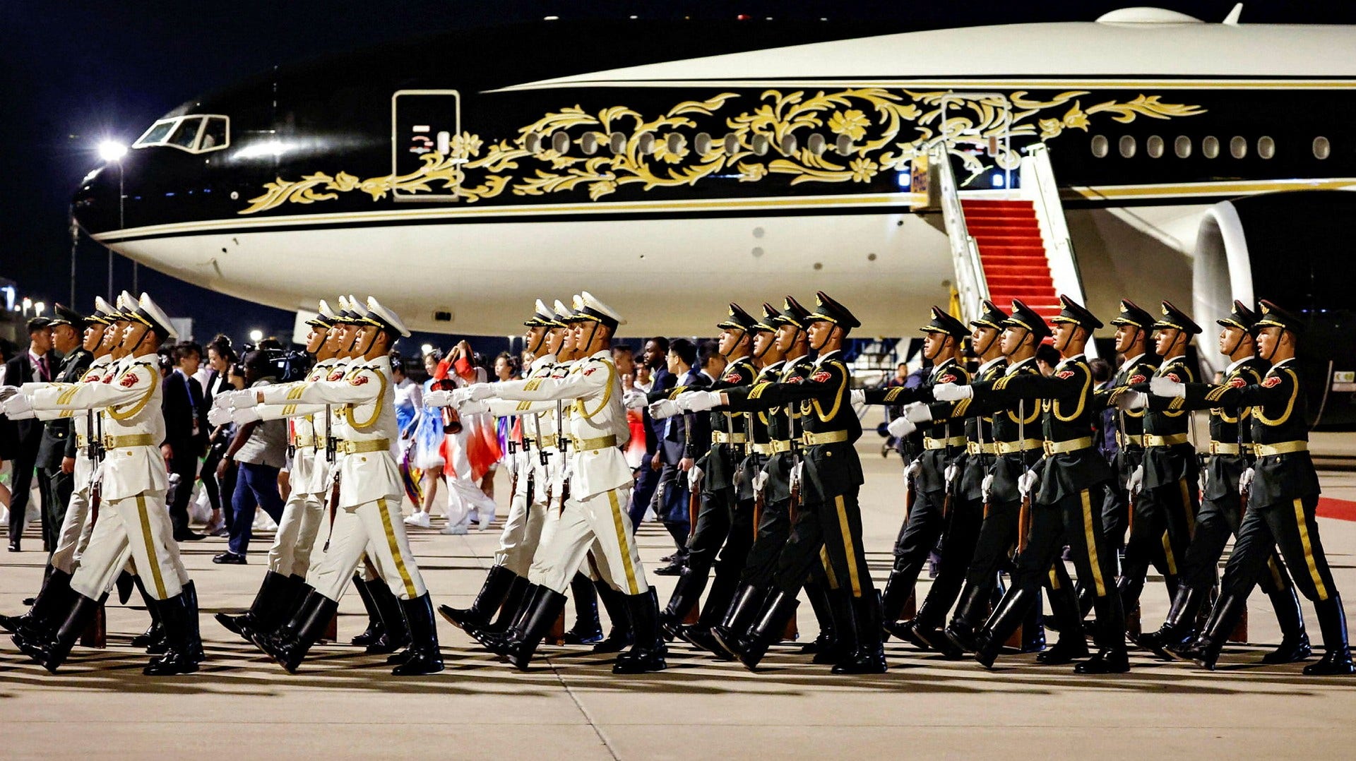 A military parade welcomes Equatorial Guinea's President Teodoro Obiang Nteuma Mbasogo to Beijing's airport. Mbasogo is to attend the FOCAC summit from Wednesday to Friday.