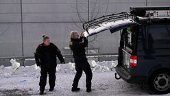 Polisens tekniker på plats i Södertälje där en man misstänks ha mördat på sin 9-årige son.