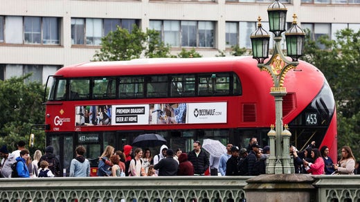 Classic red double decker in London.  The transport company is owned by the municipality.