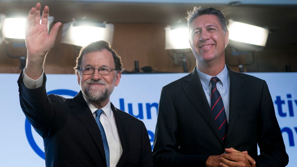 Spaniens premiärminister Mariano Rajoy och Xavier Garcia Albiol, ledare för det konservativa partiet Partido Popular de Cataluña, under en pressträff.